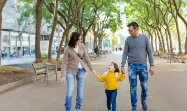 Family walking in park