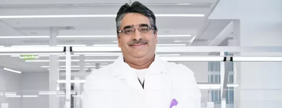 Scientist in lab smiling