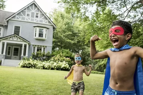Two boys playing outdoors 
