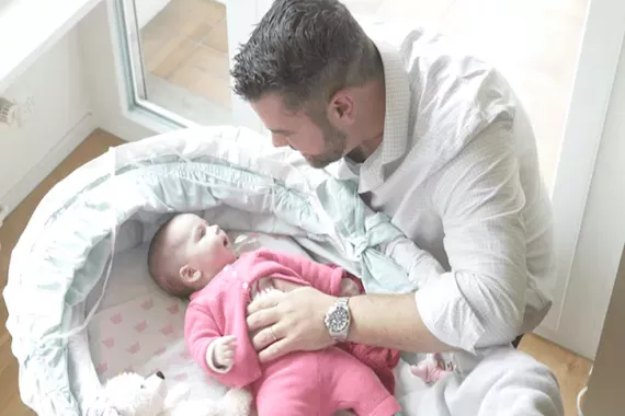 Michael sharing precious moments with his new son